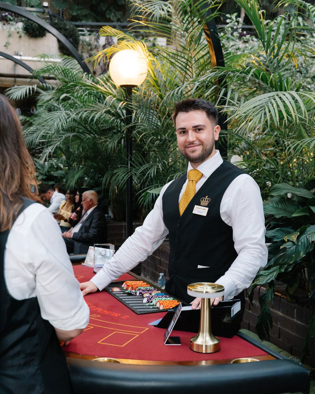 George Bentley, Managing Director of Royale Casino Hire, on the tables at a Barbican wedding
