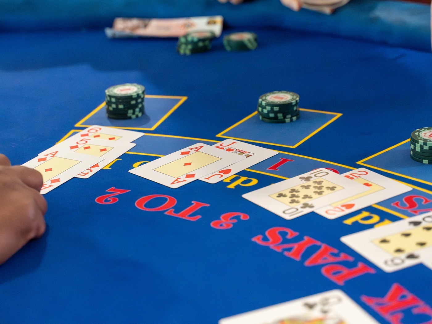 Guests playing under low warm light