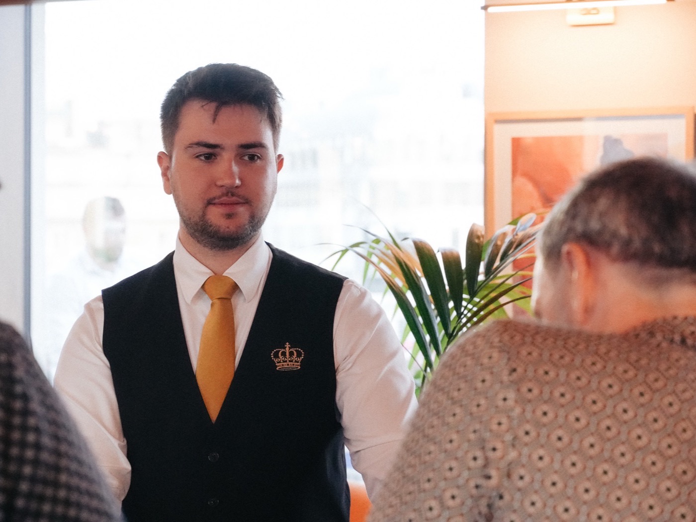 Croupier dealing, focused, hands steady