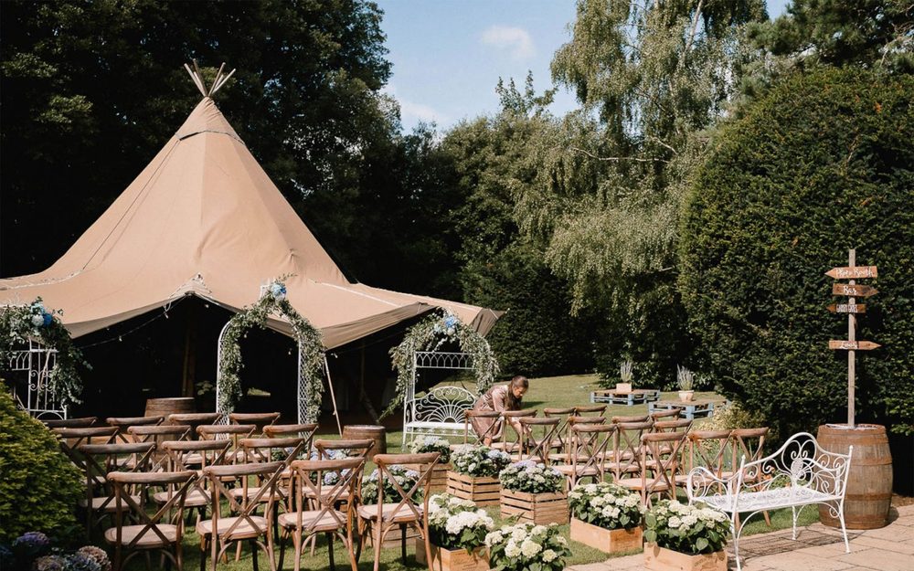 A luxury sailcloth marquee dressed for an event by Events Under Canvas